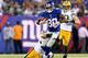 EAST RUTHERFORD, NJ - NOVEMBER 17: Victor Cruz #80 of the New York Giants is tackled by Micah Hyde #33 of the Green Bay Packers at MetLife Stadium on November 17, 2013 in East Rutherford, New Jersey. (Photo by Elsa/Getty Images)