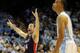 Nov 17, 2013; Chapel Hill, NC, USA; Belmont Bruins guard J.J. Mann (24) celebrates their win while North Carolina Tar Heels forward Brice Johnson (11) walks off the court at Dean E. Smith Student Activities Center. Belmont won 83-80. Mandatory Credit: Liz
