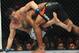 Nov 16, 2013; Las Vegas, NV, USA; Rashad Evans (red gloves) fights against Chael Sonnen (blue gloves) in their light heavyweight bout during UFC 167 at MGM Grand Garden Arena. Mandatory Credit: Stephen R. Sylvanie-USA TODAY Sports