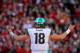 LINCOLN, NE - NOVEMBER 16: Quarterback Connor Cook #18 of the Michigan State Spartans looks for help during their game against the Nebraska Cornhuskers at Memorial Stadium on November 16, 2013 in Lincoln, Nebraska. (Photo by Eric Francis/Getty Images)