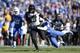 LEXINGTON, KY - NOVEMBER 9: Marcus Murphy #6 of the Missouri Tigers runs for a 27-yard gain during first half action against the Kentucky Wildcats at Commonwealth Stadium on November 9, 2013 in Lexington, Kentucky. (Photo by Joe Robbins/Getty Images)