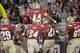 TALLAHASSEE, FL - NOVEMBER 16: Chris Casher #21 of the Florida State Seminoles and teammates celebrate a touchdown during the Second half at Doak Campbell Stadium on November 16, 2013 in Tallahassee, Florida. The Seminoles beat the Orange 59-3.(Photo by J