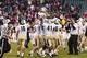 Nov 16, 2013; Philadelphia, PA, USA; UCF Knights players lift kicker Shawn Moffitt (83) in the air after he kicked the game winning field goal as time expired during the fourth quarter against the Temple Owls at Lincoln Financial Field. UCF defeated Temp