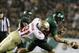 September 29, 2012; Tampa, FL, USA; Florida State Seminoles defensive end Cornellius Carradine (91) forces South Florida Bulls quarterback Matt Floyd (11) to fumble the ball during the second half at Raymond James Stadium. Florida State Seminoles defeated