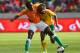 PORT ELIZABETH, SOUTH AFRICA - NOVEMBER 12: Seydou Doumbia of Cote D'Ivoire and Reneilwe Letsholonyane of Bafana Bafana compete during the Nelson Mandela Challenge match between South Africa and Ivory Coast at Nelson Mandela Bay Stadium on November 12, 20