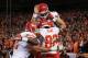 DENVER, CO - NOVEMBER 17: Dwayne Bowe #82 of the Kansas City Chiefs celebrates his second quarter touchdown against the Denver Broncos with teammates at Sports Authority Field at Mile High on November 17, 2013 in Denver, Colorado. (Photo by Doug Pensin