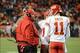 November 17, 2013; Denver, CO, USA; Kansas City Chiefs head coach Andy Reid (left) talks to quarterback Alex Smith (11) during the fourth quarter against the Denver Broncos at Sports Authority Field at Mile High. The Broncos defeated the Chiefs 27-17. Man