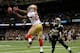 NEW ORLEANS, LA - NOVEMBER 17: Vernon Davis #85 of the San Francisco 49ers fails to pull in this touchdown reception against Rafael Bush #25 of the New Orleans Saints at Mercedes-Benz Superdome on November 17, 2013 in New Orleans, Louisiana. (Photo by K