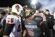 DEKALB, IL - NOVEMBER 13: Jordan Lynch #6 of the Northern Illinois Huskies shakes hands with Ball State Cardinals players at Huskie Stadium on November 13, 2013 in DeKalb, Illinois. Northern Illinois defeated Ball State 48-27. (Photo by Brian Kersey/Get