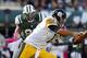 EAST RUTHERFORD, NJ - OCTOBER 13: Defensive end Muhammad Wilkerson #96 of the New York Jets closes in on quarterback Ben Roethlisberger #7 of the Pittsburgh Steelers in the fourth quarter during a game at MetLife Stadium on October 13, 2013 in East Ruther
