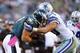 PHILADELPHIA, PA - OCTOBER 20: Tight end Brent Celek #87 of the Philadelphia Eagles makes a first down catch and is tackled by linebacker Sean Lee #50 of the Dallas Cowboys in the fourth quarter during a game at Lincoln Financial Field on October 20, 2013