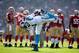SAN FRANCISCO, CA - NOVEMBER 10: Cam Newton #1 of the Carolina Panthers streches during a timeout of their game against the San Francisco 49ers at Candlestick Park on November 10, 2013 in San Francisco, California. (Photo by Ezra Shaw/Getty Images)