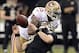 Nov 17, 2013; New Orleans, LA, USA; San Francisco 49ers outside linebacker Ahmad Brooks (55) clotheslines New Orleans Saints quarterback Drew Brees (9) behind the line of scrimmage during the fourth quarter at the Mercedes-Benz Superdome. San Francisco 49