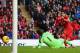LIVERPOOL, ENGLAND - NOVEMBER 09: Luis Suarez of Liverpool scores the third goal during the Barclays Premier League match between Liverpool and Fulham at Anfield on November 9, 2013 in Liverpool, England. (Photo by Alex Livesey/Getty Images)