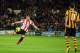 HULL, ENGLAND - NOVEMBER 02: Sunderland's Phillip Bardsley volleys wide of the goal past Hull City's Robbie Brady during the Barclays Premier League match between Hull City and Sunderland at KC Stadium on November 02, 2013 in Hull, England. (Photo by Ti