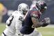 HOUSTON, TX- NOVEMBER 17: Andre Johnson #80 of the Houston Texans runs past Tracy Porter #23 of the Oakland Raiders on November 17, 2013 at Reliant Stadium in Houston, Texas. Raiders won 28 to 23.(Photo by Thomas B. Shea/Getty Images)