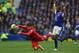 LIVERPOOL, ENGLAND - OCTOBER 28: Luis Suarez of Liverpool goes down as he competes with Sylvain Distin of Everton during the Barclays Premier League match between Everton and Liverpool at Goodison Park on October 28, 2012 in Liverpool, England. (Photo b