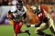 MIAMI GARDENS, FL - JANUARY 01: Jordan Lynch #6 of the Northern Illinois Huskies runs with the ball in the third quarter against Xavier Rhodes #27 of the Florida State Seminoles the Florida State Seminoles during the Discover Orange Bowl at Sun Life Stad