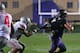EVANSTON, IL - OCTOBER 05: Kain Colter #2 of the Northwestern Wildcats is grabbed by Ryan Shazier #2 of the Ohio State Buckeyes at Ryan Field on October 5, 2013 in Evanston, Illinois. Ohio State defeated Northwestern 40-30. (Photo by Jonathan Daniel/Gett