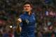 PARIS, FRANCE - OCTOBER 15: Olivier Giroud of France celebrates scoring his teams second goal during the FIFA 2014 World Cup Qualifying Group I match between France and Finland at the Stade de France on October 15, 2013 in Paris, France. (Photo by Julia