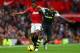 MANCHESTER, ENGLAND - OCTOBER 26: Nani of Manchester United is tackled by Wilson Palacios of Stoke City during the Barclays Premier League match between Manchester United and Stoke City at Old Trafford on October 26, 2013 in Manchester, England. (Photo