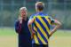 ST ALBANS, ENGLAND - AUGUST 26: Manager Arsene Wenger of Arsenal speaks to Per Mertesacker during a training session ahead of their UEFA Champions League Play Off second leg match against Fenerbache at London Colney on August 26, 2013 in St Albans, Engla