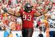 TAMPA, FL - NOVEMBER 11: Defensive tackle Gerald McCoy #93 of the Tampa Bay Buccaneers celebrates a 34 - 24 victory against the San Diego Chargers November 11, 2012 at Raymond James Stadium in Tampa, Florida. Tampa won 34 - 24. (Photo by Al Messerschmidt/