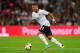 LONDON, ENGLAND - AUGUST 14: Alex Oxlade-Chamberlain of England runs with the ball during the International Friendly match between England and Scotland at Wembley Stadium on August 14, 2013 in London, England. (Photo by Mike Hewitt/Getty Images)