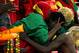Burkina Faso's Jonathan Pitroipa, right, celebrates with soccer fan after scoring a winning goal during their African Cup of Nations quarter final soccer match against Togo