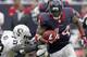 HOUSTON, TX- NOVEMBER 17: Ben Tate #44 of the Houston Texans rushes past Nick Roach #53 of the Oakland Raiders on November 17, 2013 at Reliant Stadium in Houston, Texas. Raiders won 28 to 23.(Photo by Thomas B. Shea/Getty Images)