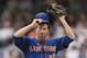 MILWAUKEE, WI - JULY 6: Shaun Marcum #38 of the New York Mets wipes the sweat from his face against the Milwaukee Brewers during the second inning at Miller Park on July 6, 2013 in Milwaukee, Wisconsin. (Photo by Tom Lynn/Getty Images)