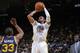 OAKLAND, CA - NOVEMBER 16: Andre Iguodala #9 of the Golden State Warriors shoots against Mike Harris #33 of the Utah Jazz on November 16, 2013 at Oracle Arena in Oakland, California. NOTE TO USER: User expressly acknowledges and agrees that, by downloadin