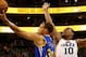 Nov 18, 2013; Salt Lake City, UT, USA; Golden State Warriors point guard Stephen Curry (30) lays the ball up to the basket while Utah Jazz point guard Alec Burks (10) tries to block the shot during the first quarter at EnergySolutions Arena. Mandatory Cre