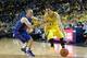 ANN ARBOR, MI - NOVEMBER 08: Mark Cornelius #30 of the Massachusetts Lowell River Hawks defends Nik Stauskas #11 of the Michigan Wolverines during the first half of the game at Crisler Center on November 8, 2013 in Ann Arbor, Michigan. Michigan defeated U