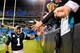 CHARLOTTE, NC - NOVEMBER 18: Cam Newton #1 of the Carolina Panthers celebrates with fans after a win over the New England Patriots at Bank of America Stadium on November 18, 2013 in Charlotte, North Carolina. The Panthers won 24-20. (Photo by Grant Halv