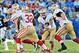 Oct 20, 2013; Nashville, TN, USA; San Francisco 49ers quarterback Colin Kaepernick (7) pitches to running back Kendall Hunter (32) against the Tennessee Titans during the first half at LP Field. Mandatory Credit: Jim Brown-USA TODAY Sports