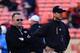 August 30, 2012; San Francisco, CA, USA; San Francisco 49ers offensive coordinator Greg Roman (left) and head coach Jim Harbaugh (right) watch before the game against the San Diego Chargers at Candlestick Park. Mandatory Credit: Kyle Terada-USA TODAY Spor
