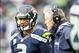 Nov 17, 2013; Seattle, WA, USA; Seattle Seahawks head coach Pete Carroll speaks with Seattle Seahawks quarterback Russell Wilson (3) during a third quarter timeout against the Minnesota Vikings at CenturyLink Field. Mandatory Credit: Joe Nicholson-USA TOD