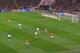 Four England players press the ball high, leaving gaps.