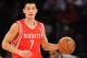 NEW YORK, NY - NOVEMBER 14: Jeremy Lin #7 of the Houston Rockets carries the ball down court during the first quarter against the New York Knicks at Madison Square Garden on November 14, 2013 in New York City. NOTE TO USER: User expressly acknowledges and