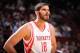 HOUSTON, TX - NOVEMBER 11: Omri Casspi #18 of the Houston Rockets looks on against the Toronto Raptors on November 11, 2013 at the Toyota Center in Houston, Texas. NOTE TO USER: User expressly acknowledges and agrees that, by downloading and or using this