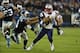 Nov 18, 2013; Charlotte, NC, USA; New England Patriots running back Shane Vereen (34) runs as Carolina Panthers free safety Mike Mitchell (21) defends in the second quarter at Bank of America Stadium. Mandatory Credit: Bob Donnan-USA TODAY Sports
