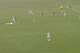 Pogba spots danger early and races in to intercept high.