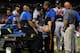 NEW YORK, NY - JULY 24: Tim Hudson #15 of the Atlanta Braves is attented to after being injured on a play at first base in the eighth inning against the New York Mets at Citi Field on July 24, 2013 at Citi Field in the Flushing neighborhood of the Queens
