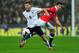 LONDON, ENGLAND - NOVEMBER 15: Adam Lallana of England holds off Eugenio Mena of Chile during the international friendly match between England and Chile at Wembley Stadium on November 15, 2013 in London, England. (Photo by Shaun Botterill/Getty Images)