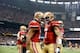 NEW ORLEANS, LA - FEBRUARY 03: Colin Kaepernick #7 of the San Francisco 49ers celebrates with teammate Michael Crabtree after a touchdown was scored against the Baltimore Ravens during Super Bowl XLVII at the Mercedes-Benz Superdome on February 3, 2013