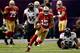 NEW ORLEANS, LA - FEBRUARY 03: Michael Crabtree #15 of the San Francisco 49ers runs with the ball after catching a pass against the Baltimore Ravens in the first quarter during Super Bowl XLVII at the Mercedes-Benz Superdome on February 3, 2013 in New Or