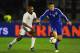 SERRAVALLE, SAN MARINO - MARCH 22: Alex Gasperoni of San Marino is closed down by Jermain Defoe of England during the FIFA 2014 World Cup Qualifier Group H match between San Marino and England at Serravalle Stadium on March 22, 2013 in Serravalle, San Mar