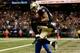 NEW ORLEANS, LA - OCTOBER 27: Kenny Stills #84 of the New Orleans Saints catches a touchdown pass over Nickell Robey #37 of the Buffalo Bills at Mercedes-Benz Superdome on October 27, 2013 in New Orleans, Louisiana. (Photo by Chris Graythen/Getty Image