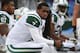 ORCHARD PARK, NY - NOVEMBER 17: Geno Smith #7 of the New York Jets looks on from the bench after throwing an interception during NFL game action against the Buffalo Bills at Ralph Wilson Stadium on November 17, 2013 in Orchard Park, New York. (Photo by To